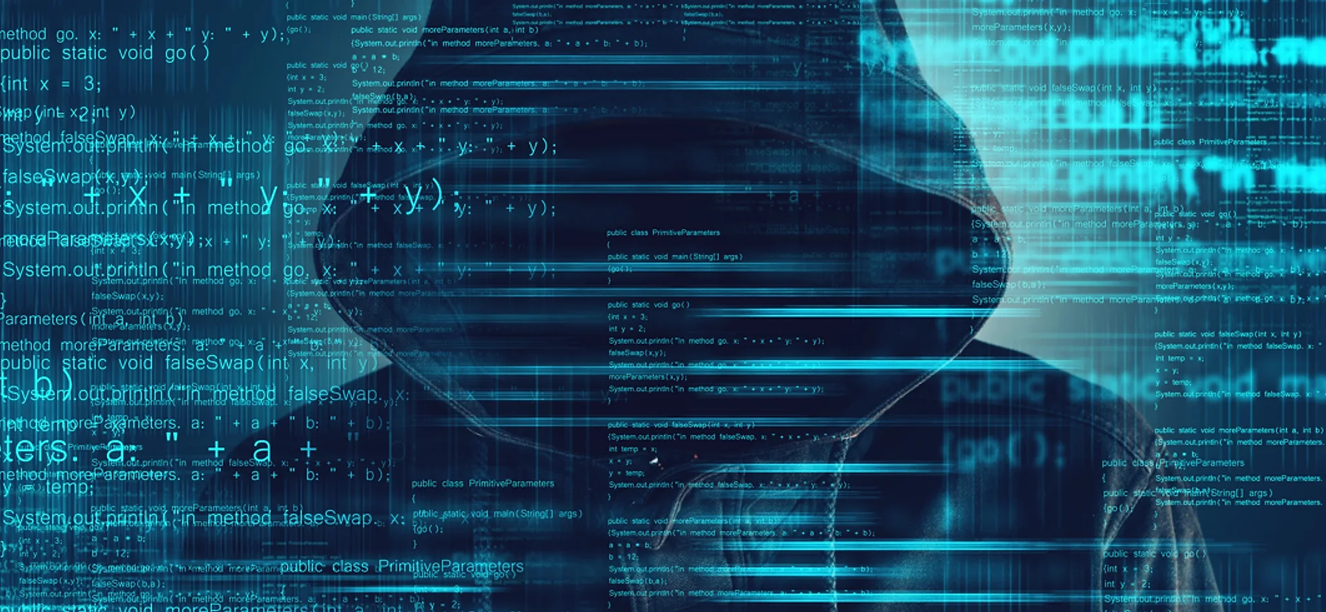 A hooded figure silhouetted behind a wall of glowing cyan program code